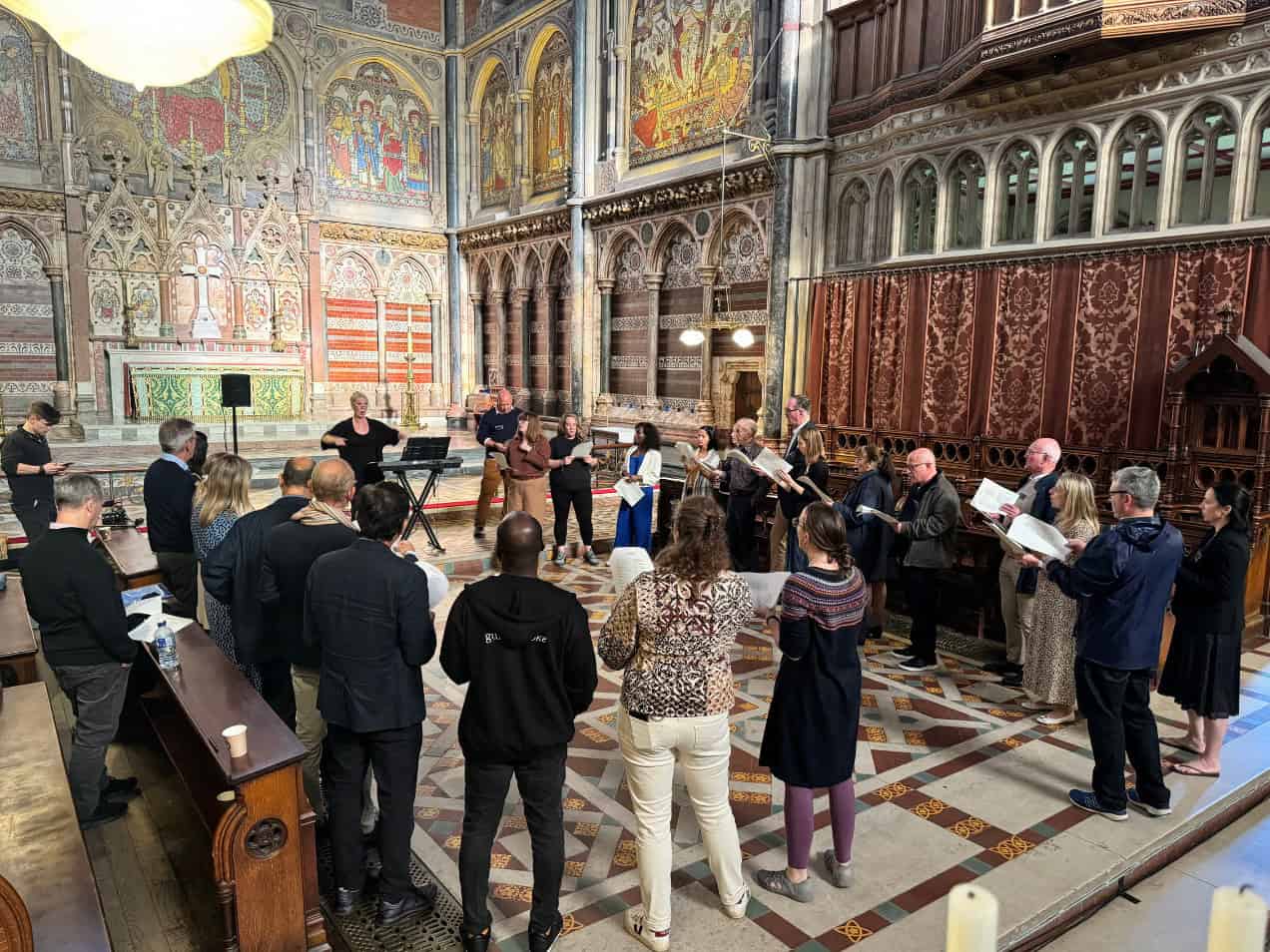 A group of people singing in a church