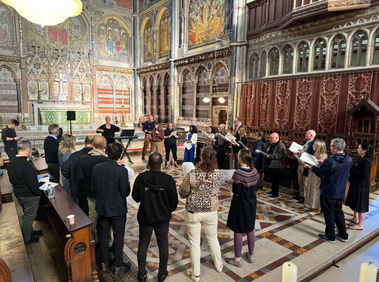 A group of people singing in a church